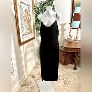 Trending - Black slip dress with spaghetti straps 
size 8
